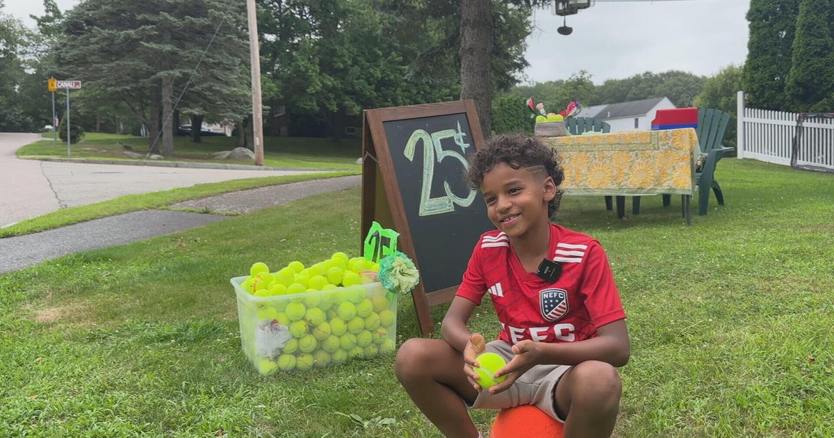 8-year-old turns surplus tennis balls into neighborhood stand in Milford 