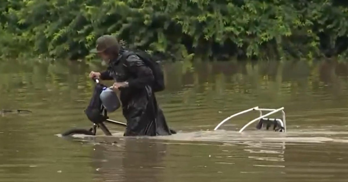 Flash floods and heat inundate millions of Americans - CBS News