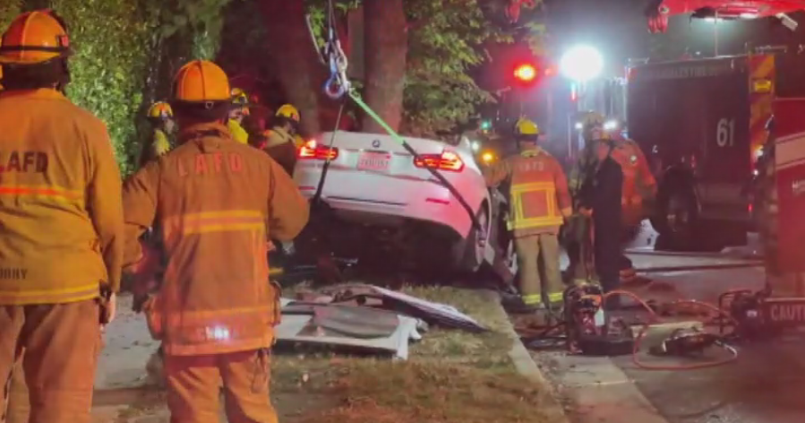 4 people rescued from car after crash in Beverly Grove 