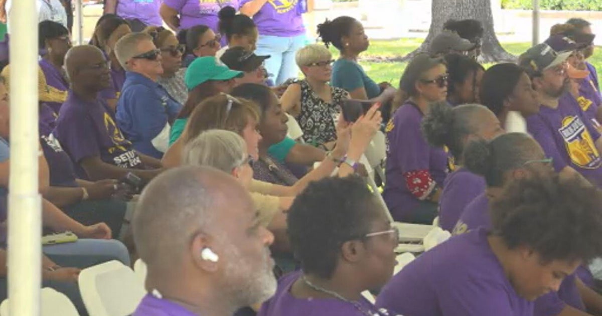 Miami health care workers rally in support of immigrants, speaking out against