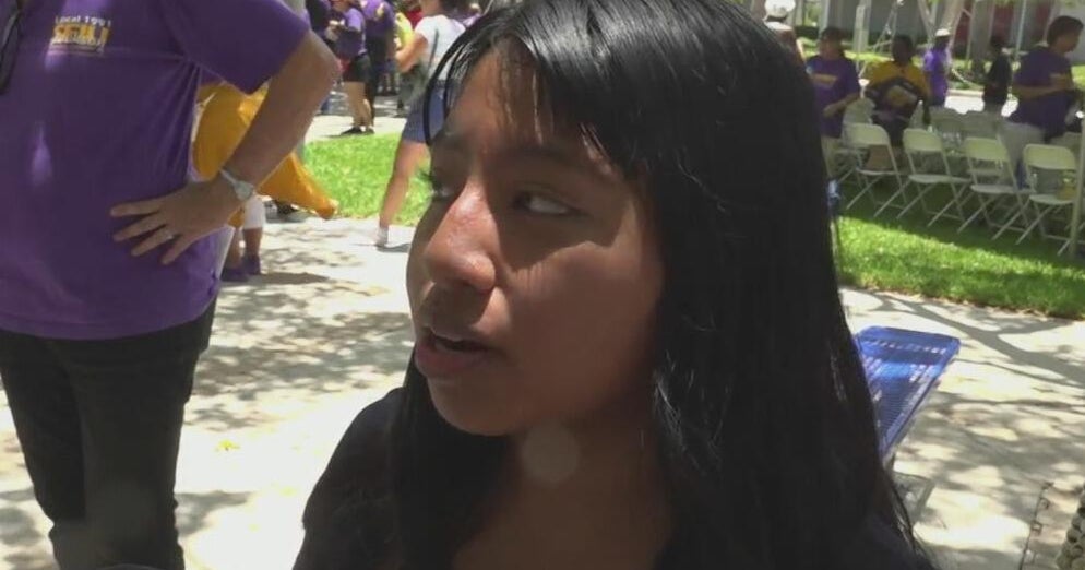 Protesters gather in front of Jackson Memorial Hospital – CBS News
