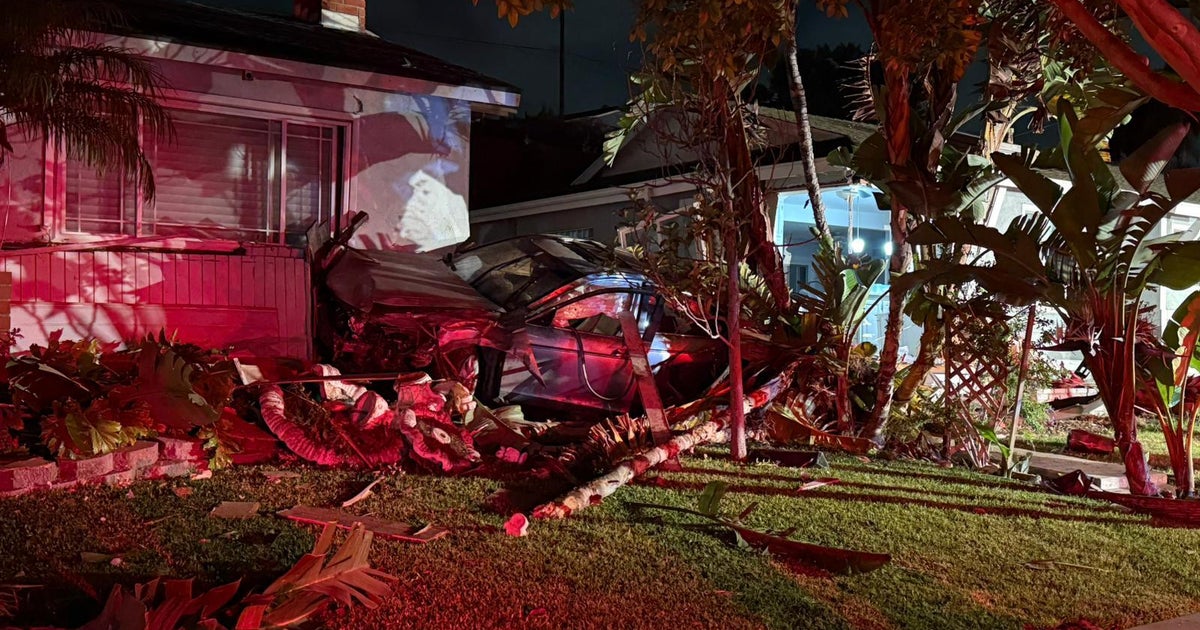 Multiple homes damaged after teen loses control of car and crashes in Huntington Beach 