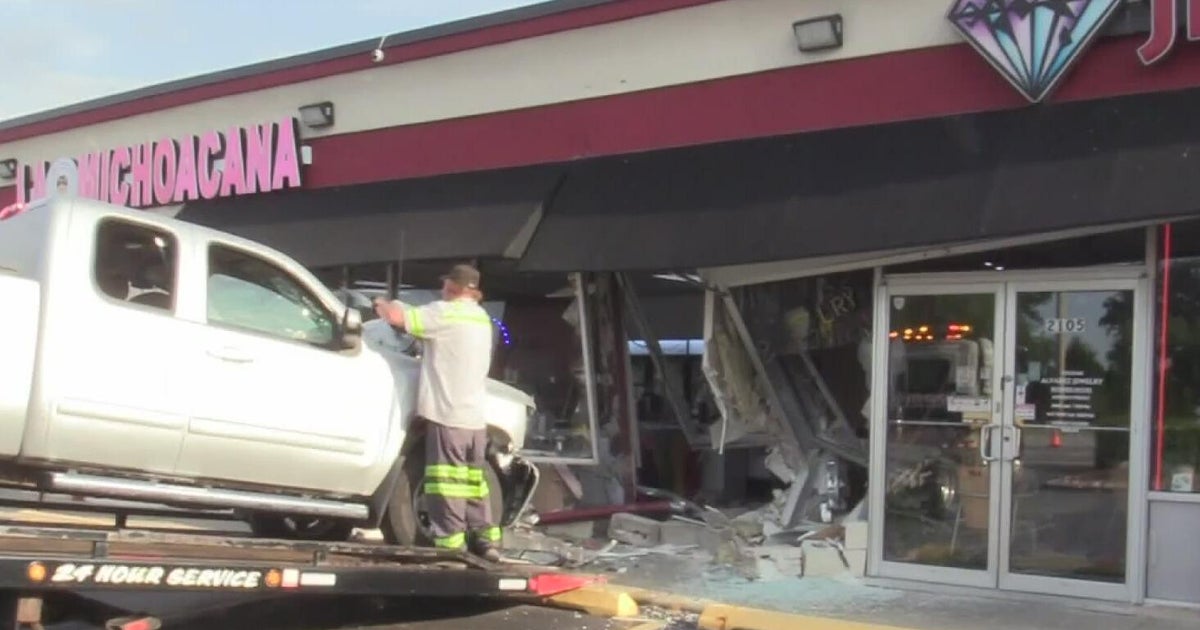 2 hurt after pickup truck crashes into strip mall in Hanover Park 