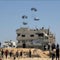 Israel pauses attacks in some areas in Gaza to allow limited aid in