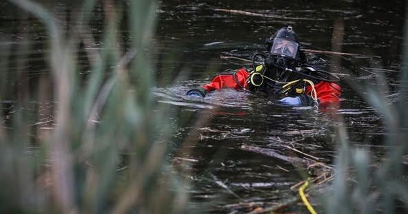 Car found in Cary pond with no one inside or around 