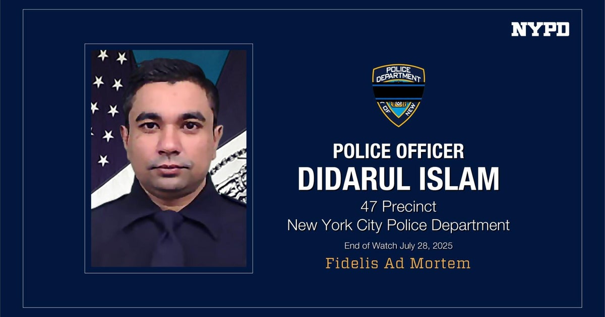 Father of slain NYPD detective says he's in "darkness" without his son 
