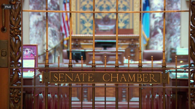 "VOTE" directional sign 