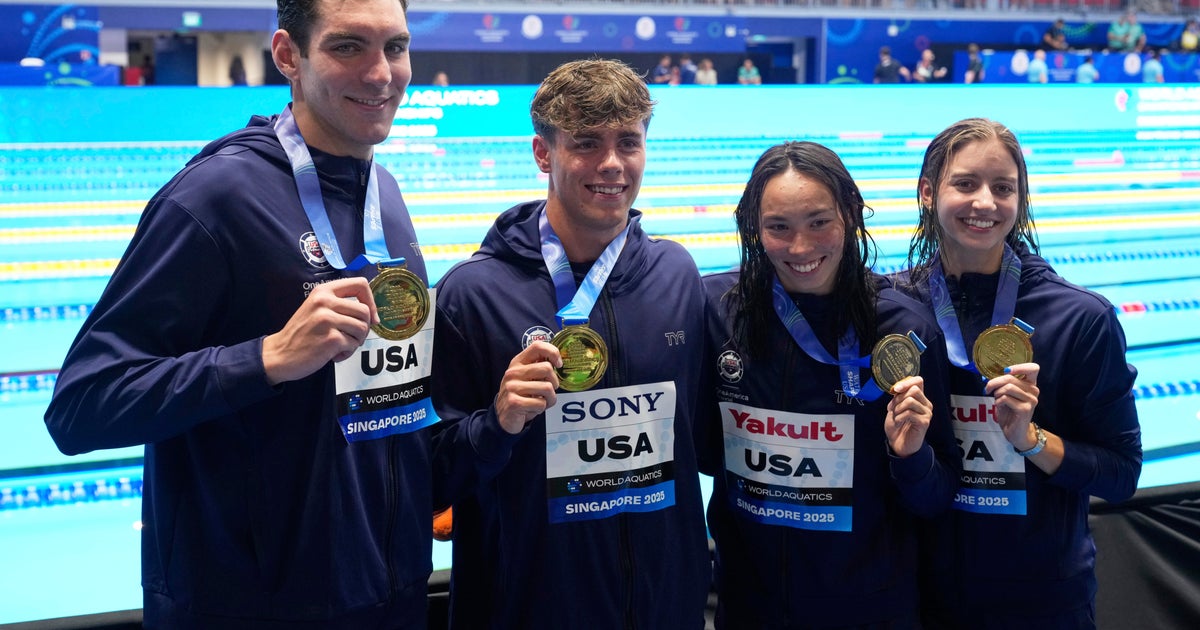 Team USA sets new relay record at swim worlds and Ledecky wins again