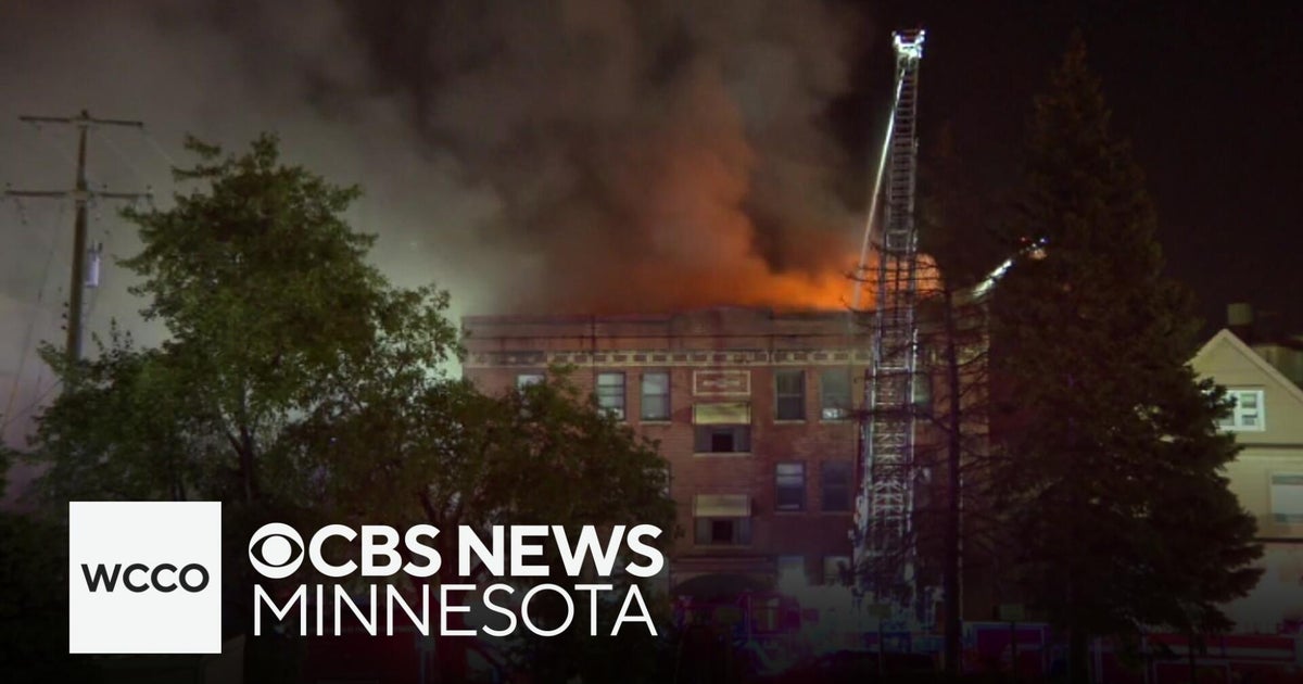 A year after a deadly fire, an apartment complex reopens - CBS Minnesota