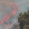 Dozens of wildfires burn across western U.S.