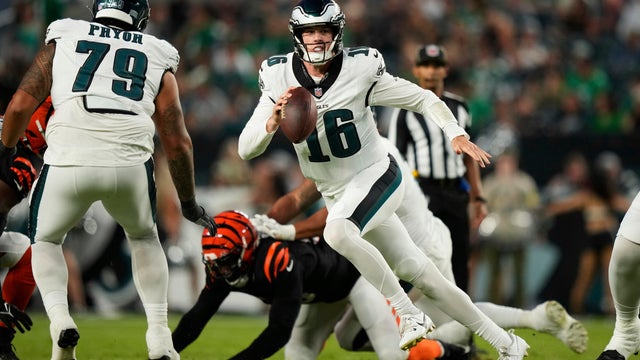 Philadelphia Eagles quarterback Tanner McKee (16) runs with the ball during the first half of an NFL preseason football game against the Cincinnati Bengals 