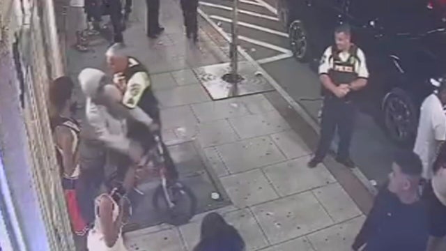 Surveillance footage shows a police sergeant grabbing a teenager by the neck. 