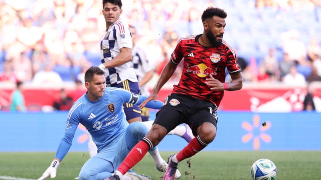 Eric Maxim Choupo-Moting #13 of New York Red Bulls turns while pressured by Rafael Cabral #1 of Real Salt Lake during the first half at Sports Illustrated Stadium on August 10, 2025 in Harrison, New Jersey. 