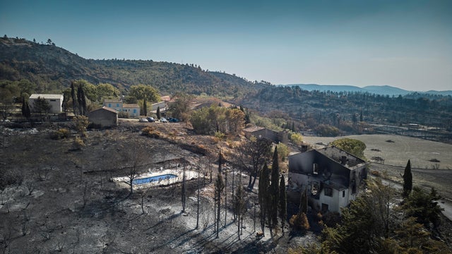 Deadly Wildfires Leave Path Of Destruction Across France's Aude Region 