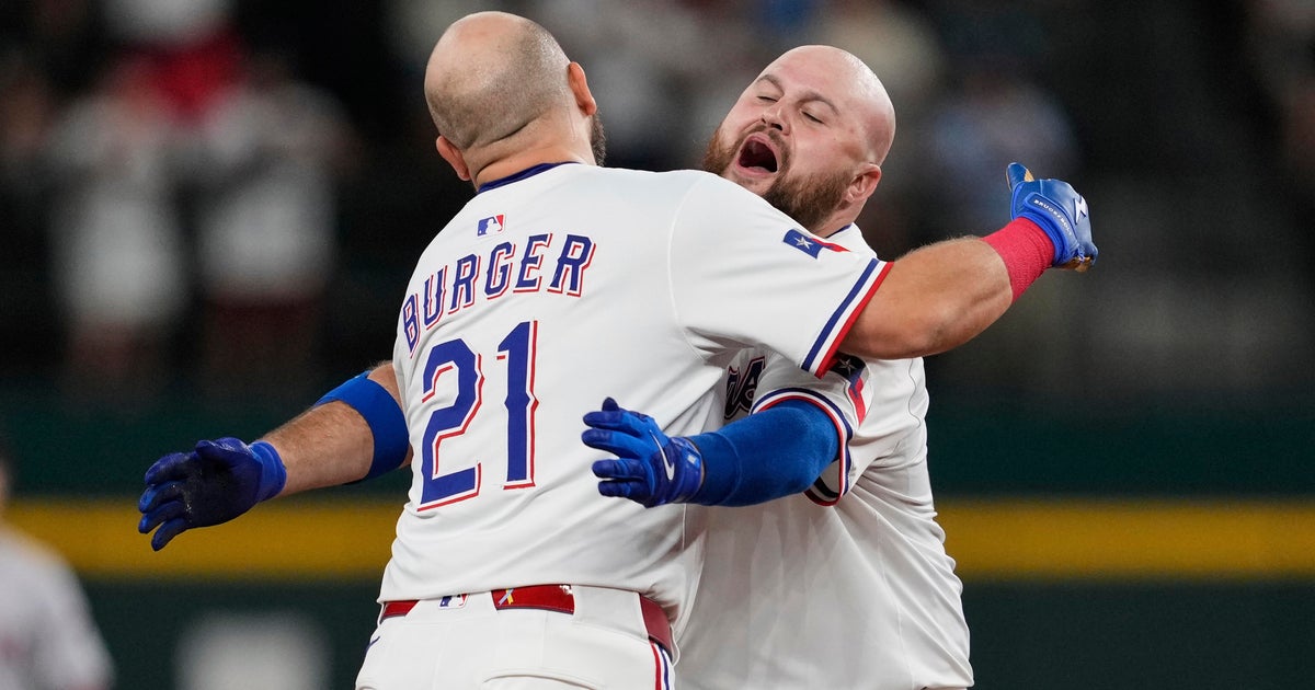Burger hits HR as Rangers end 4-game skid with win over Diamondbacks 