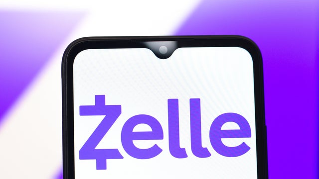 In this photo illustration, the Zelle logo is seen displayed 