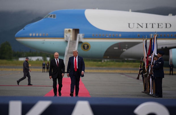 President Trump walks with Russian President Vladimir Putin as they arrives at Joint Base Elmendorf-Richardson on Aug. 15, 2025, in Anchorage, Alaska. 