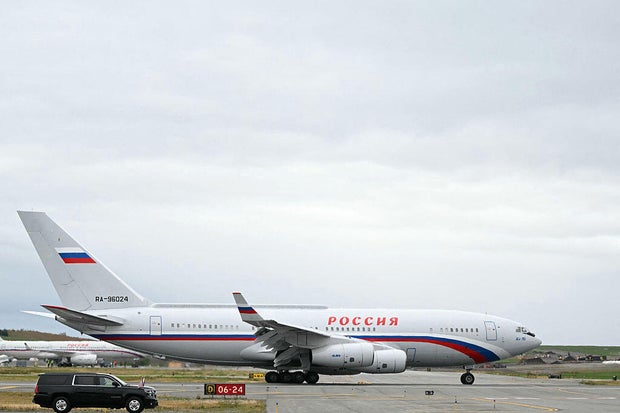 A plane carrying Russian President Vladimir Putin is seen after landing at Joint Base Elmendorf-Richardson in Anchorage, Alaska, on Aug. 15, 2025. 
