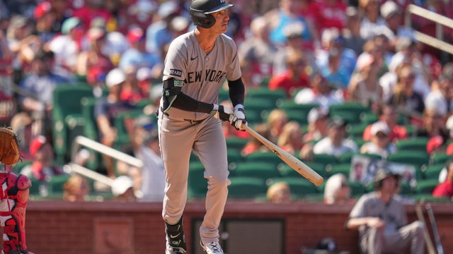 New York Yankees' Cody Bellinger watches his sacrifice fly to score Trent Grisham during the seventh inning of a baseball game against the St. Louis Cardinals Sunday, Aug. 17, 2025, in St. Louis. 