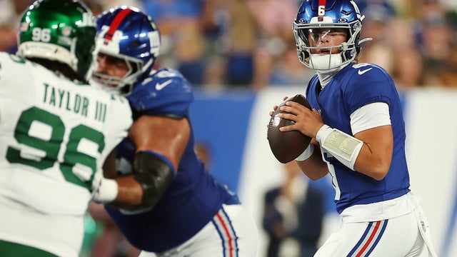 Jaxson Dart #6 of the New York Giants looks to pass during the first half of the NFL Preseason 2025 game between New York Jets and New York Giants at MetLife Stadium on August 16, 2025 in East Rutherford, New Jersey. 