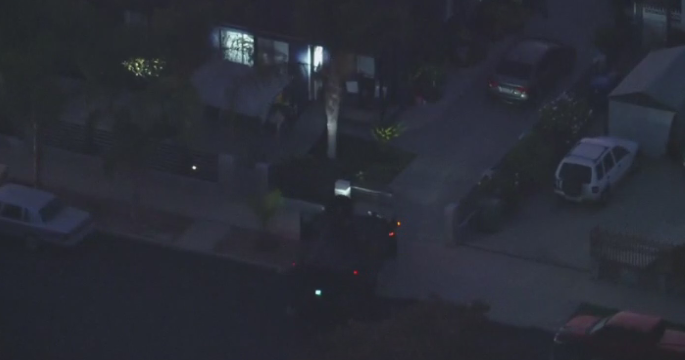 Armed suspect barricades inside Los Angeles home, forcing local school to relocate instruction for the day 