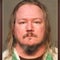 Ex-gymnastics coach arrested on child pornagraphy charge years after abuse claims