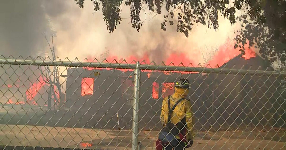 Riverbank home engulfed in flames after crews respond to grass fire 