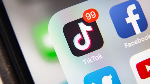 TikTok and Facebook application  on screen Apple iPhone XR 