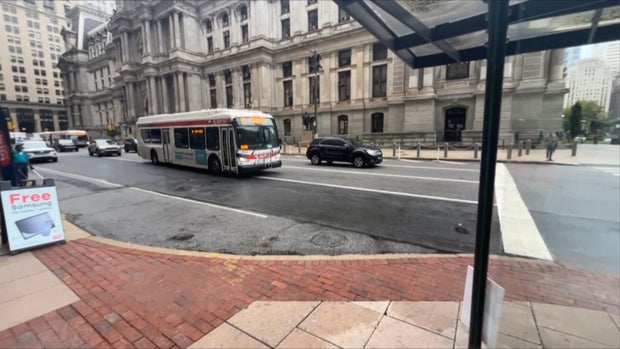 A SEPTA bus drives in front of City Hall in Philadelphia 