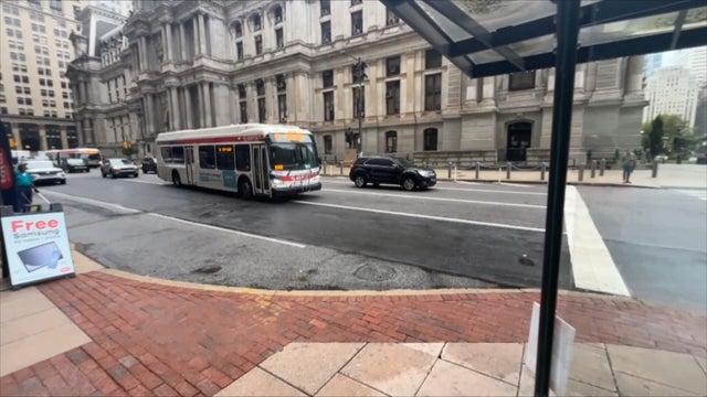 A SEPTA bus drives in front of City Hall in Philadelphia 