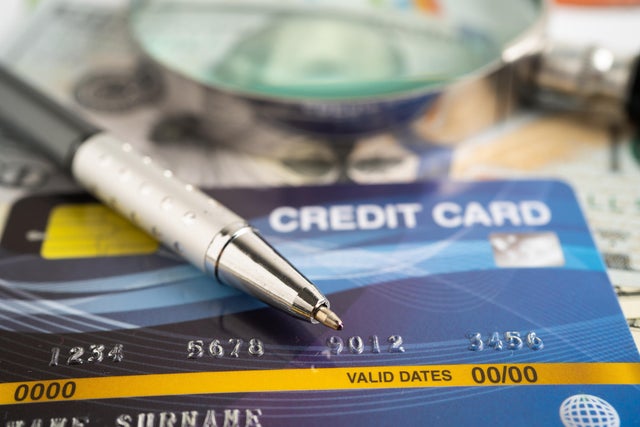 Credit card model on graph spreadsheet paper. Finance development, Banking Account, Statistics, Investment Analytic research data economy, Stock exchange trading, Business company concept. 