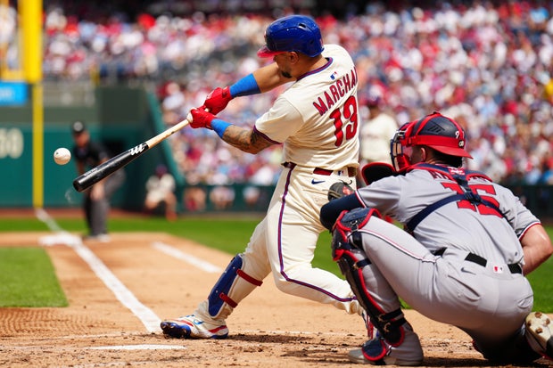 Philadelphia Phillies' Rafael Marchán hits a two run RBI double off Washington Nationals pitcher Jake Irvin during the second inning of a baseball game 