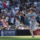 Freeman, Rushing and Ohtani power Dodgers' 8-2 victory over Padres to even the NL West race 