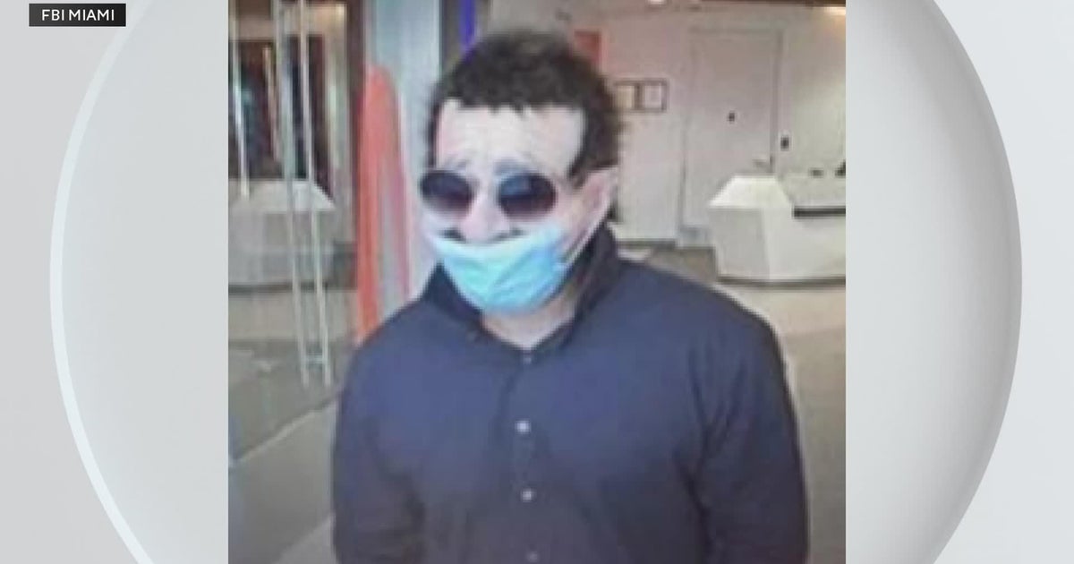 FBI releases photos of masked suspect in Broward bank robbery
