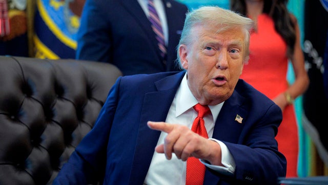 President Trump Signs Executive Orders In The Oval Office Of The White House 