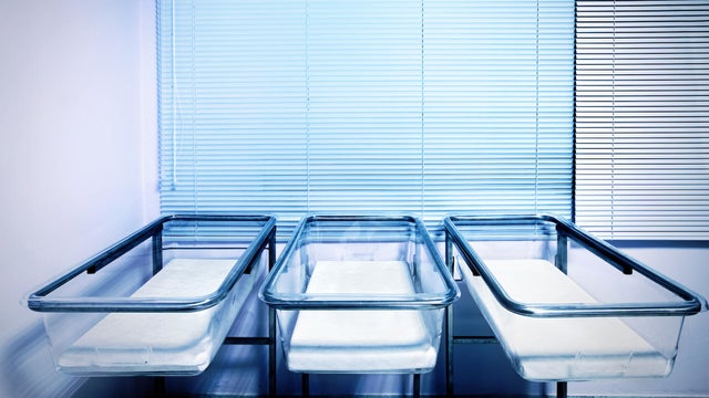 Empty baby cots 
