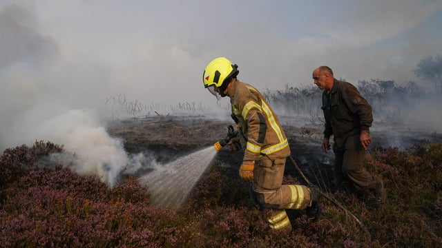                        At least 18 WWII-era weapons explode as wildfire chars U.K. countryside                   