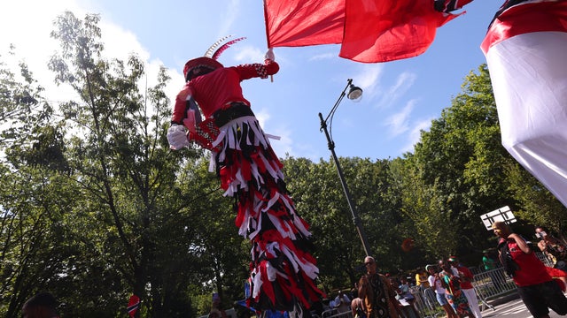 People take part in the 2024 West Indian Day Parade along the Eastern Parkway on September 02, 2024 in the Brooklyn borough of New York City. 
