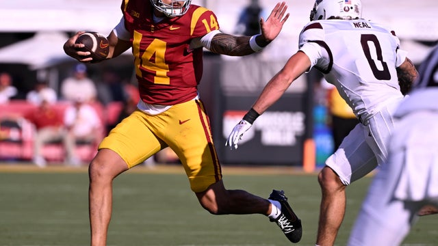 USC Trojans defeated the Missouri State Bears 73-13 to win a football game. 