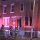 Woman jumps from second-story window as flames tear through North Philly home 