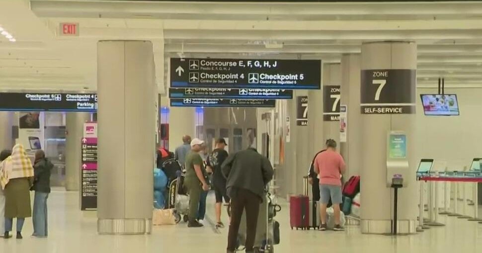 Woman charged after attempting to take child at Miami International ...