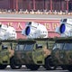 What new weapons did China show off in its massive military parade? 