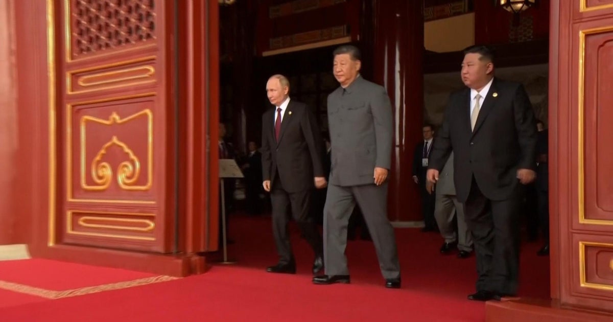 Russia's Vladimir Putin and North Korea's Kim Jong Un attend China's massive military parade