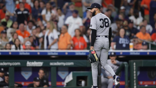 Devin Williams #38 of the New York Yankees looks on after being relieved during the eighth inning against the Houston Astros at Daikin Park on September 03, 2025 in Houston, Texas. 