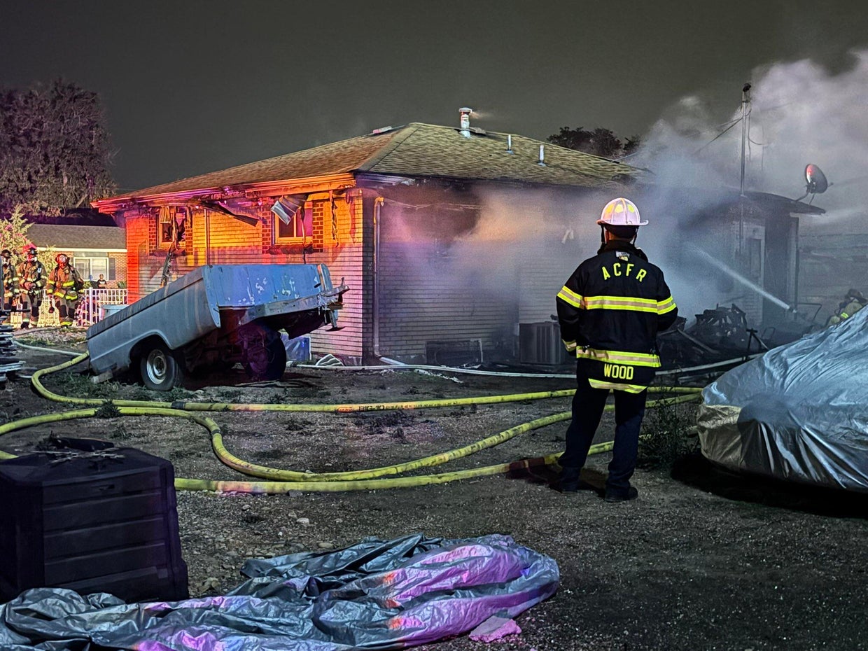 Man and dog inside burning home in Denver metro area escape unharmed ...