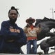 CU Denver business students in the Orange Zone after creating Broncos anthem 