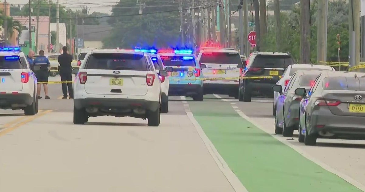 Suspect shot by Miami police officer after allegedly firing gun, waving ...