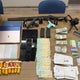 Counterfeit money, credit cards, weapons seized from West Bloomfield home 