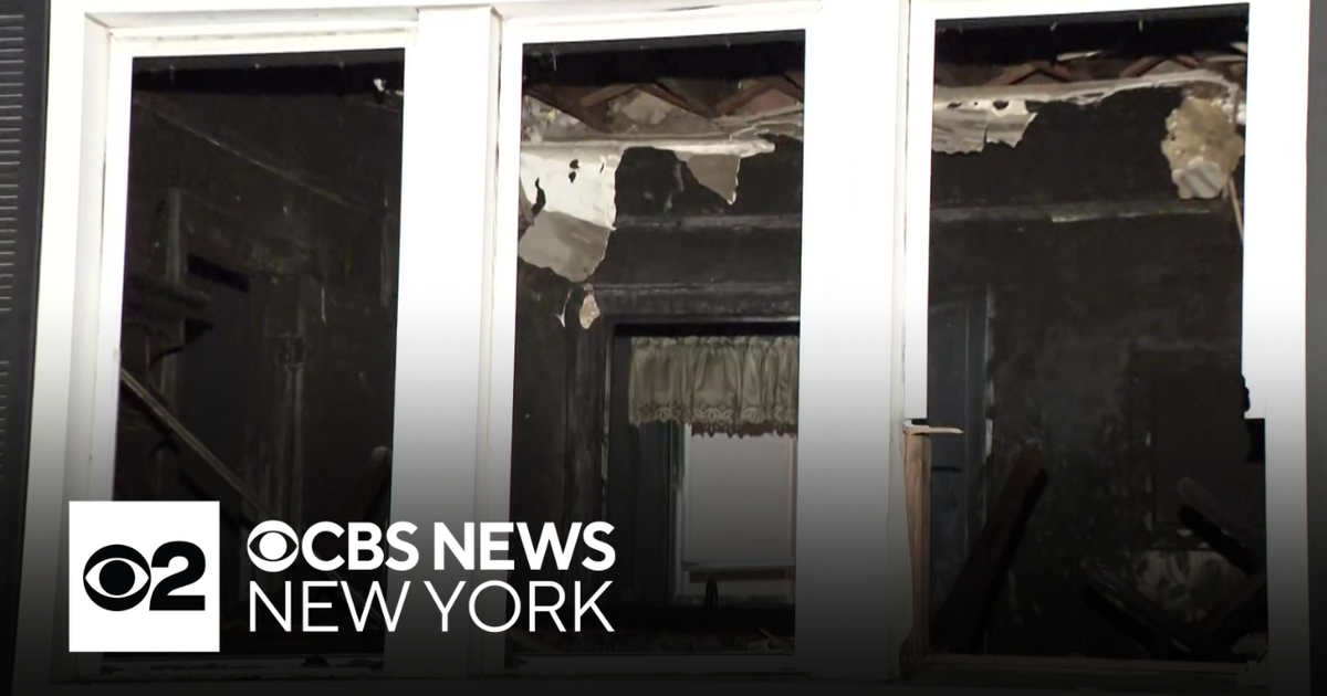 NYPD Searches Suspect in Queens Arson Murder of Elderly Couple