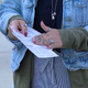 CTU members pass out legal rights flyers in preparation of immigration crackdown 